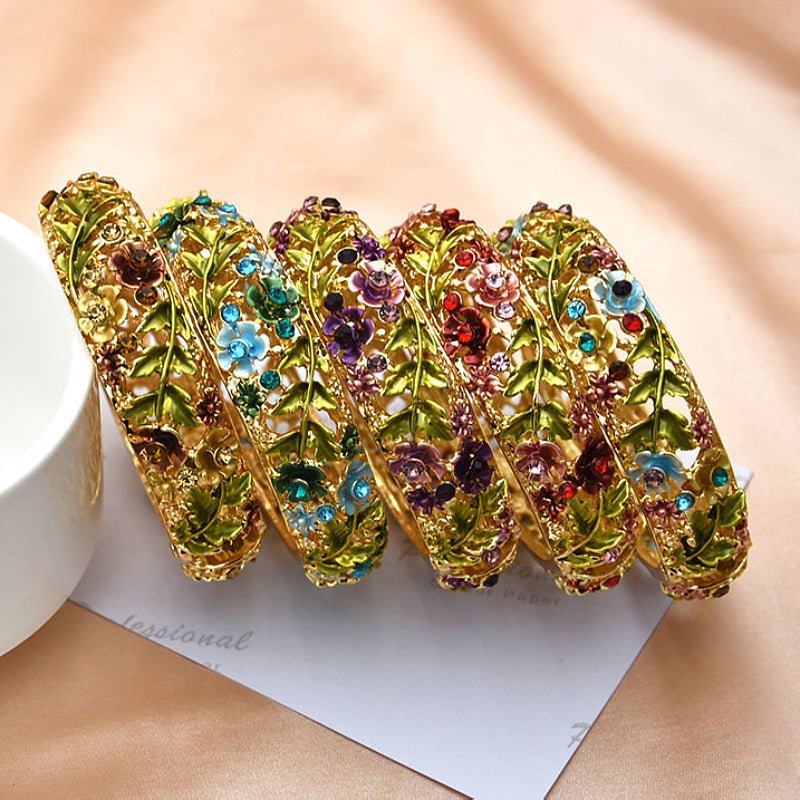 Retro Rose Diamond Studded Hollow Alloy Cloisonne Antique Painted Bracelet For Women $21.38 Dana Fashion Color: 01 Red 1492 Women's Accessories Product information: Treatment Process: Electroplating Color: 01 red 1492,02 purple 1493,03 blue 1494,04 color