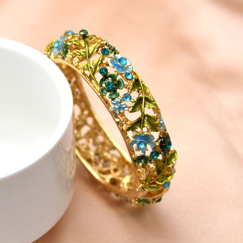 Retro Rose Diamond Studded Hollow Alloy Cloisonne Antique Painted Bracelet For Women $21.38 Dana Fashion Color: 03 Blue 1494 Women's Accessories Product information: Treatment Process: Electroplating Color: 01 red 1492,02 purple 1493,03 blue 1494,04 color