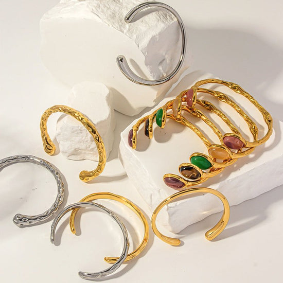 Retro Titanium Steel Plated 18K Bilateral Oval Color Natural Stone Open Irregular Adjustable Bracelet $19.00 Dana Fashion Color: Style 1 Women's Accessories Product information: Treatment Process: Electroplating Material: titanium steel Style: Retro Popul