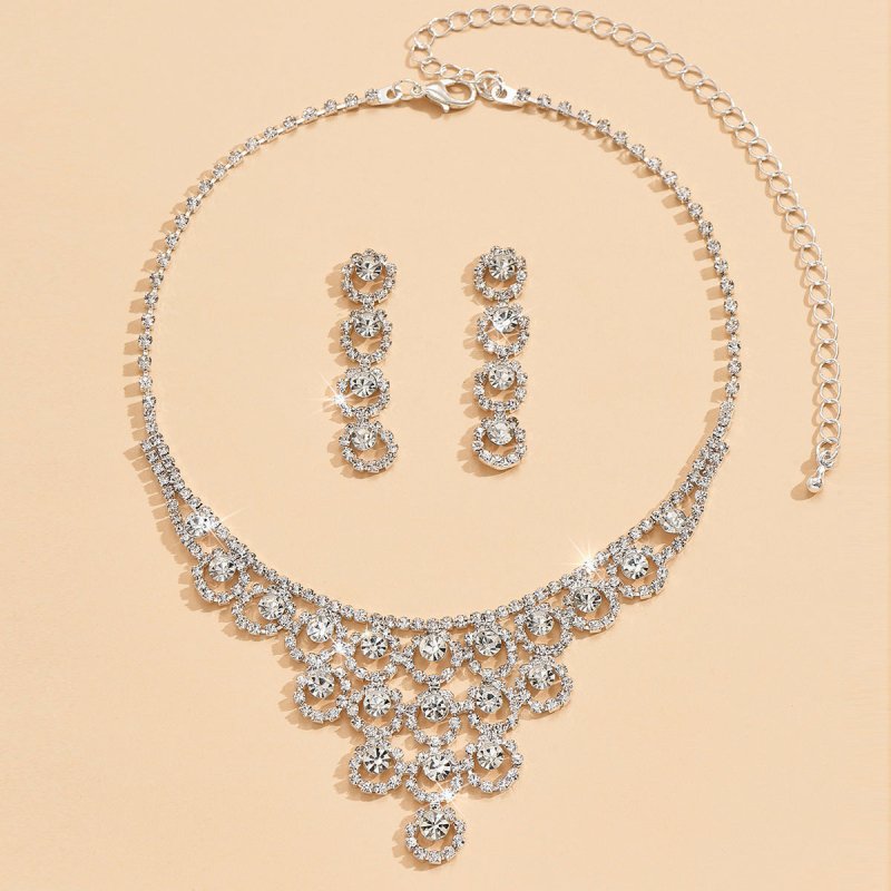 Rhinestone Necklace And Earrings Suite Women's Simple $33.59 Dana Fashion Color: Silver Suit Women's Accessories Product information: Pattern: Marine life Treatment Process: Electroplating Color: 577 silver necklace and earrings suit Applicable population