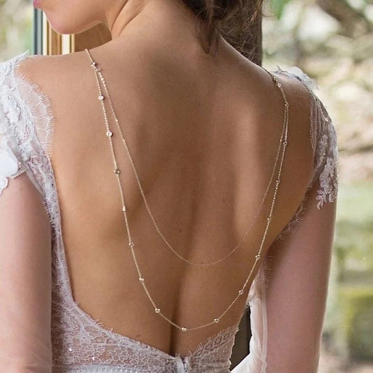Rhinestone Water Drop Back Chain Simple Wedding Dress Formal Dress Accessories $19.99 Dana Fashion Color: Gold Women's Accessories Product information: Type: body chains Color: silver, gold Style: Women's Material: Alloy Shape: drop shape Style: Simple Pa