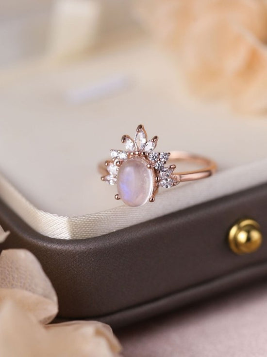 S925 Sterling Silver Oval Moonstone Micro Rhinestone Ring $39.00 Dana Fashion Color: MOON JZ1001 AA Size: No 6 Women's Accessories Product information: Type: Ring Treatment Process: Electroplating Color: MOON-JZ-100-1-AA Moonstone, MOON-JZ-100 white opal,