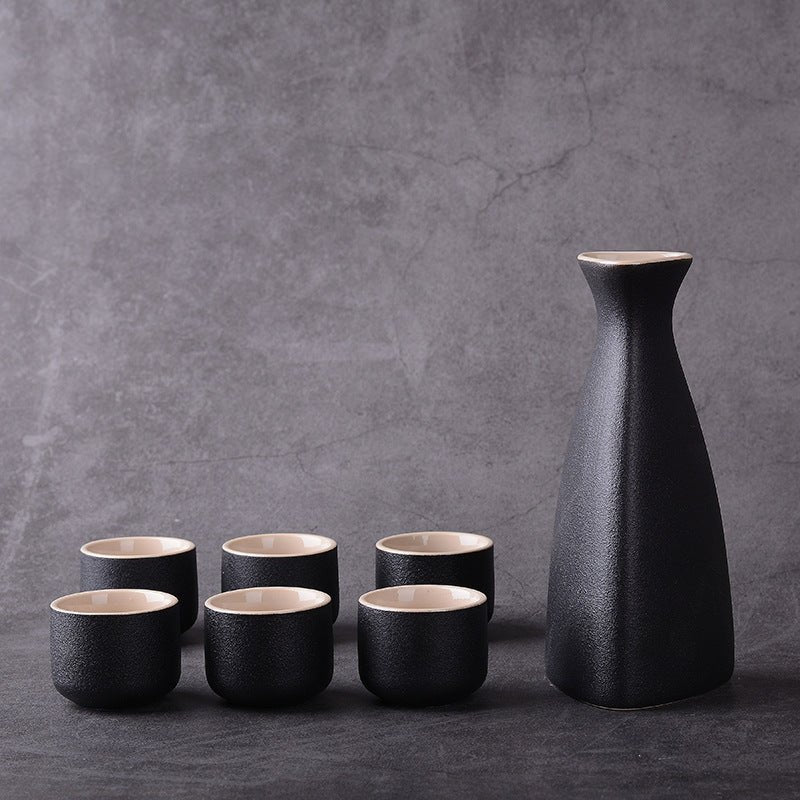 Sakura vintage sake set $25.30 Dana Fashion Color: Triangle Black Dana's Kitchen Material: Ceramic Capacity: Wine glass capacity 30ml Sake kettle capacity 250ml Triangle wine pot capacity 150ml Style: Japanese style Size: wine coarse pottery pot 1 4 cups