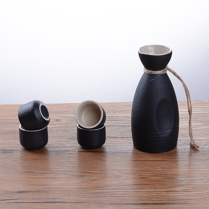 Sakura vintage sake set $28.04 Dana Fashion Color: Riangle White Dana's Kitchen Material: Ceramic Capacity: Wine glass capacity 30ml Sake kettle capacity 250ml Triangle wine pot capacity 150ml Style: Japanese style Size: wine coarse pottery pot 1 4 cups w