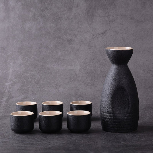 Sakura vintage sake set $28.04 Dana Fashion Color: Riangle White Dana's Kitchen Material: Ceramic Capacity: Wine glass capacity 30ml Sake kettle capacity 250ml Triangle wine pot capacity 150ml Style: Japanese style Size: wine coarse pottery pot 1 4 cups w