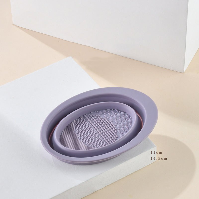 Scrubbing Plate Makeup Brush Cleaning Pad Makeup Brush Cleaning Bowl $24.00 Dana Fashion Color: Light Purple makeup Product Information Name: Makeup brush folding cleaning bowl Material: Silicone Be applicable: DIY facial mask Brewing water film Soaking b