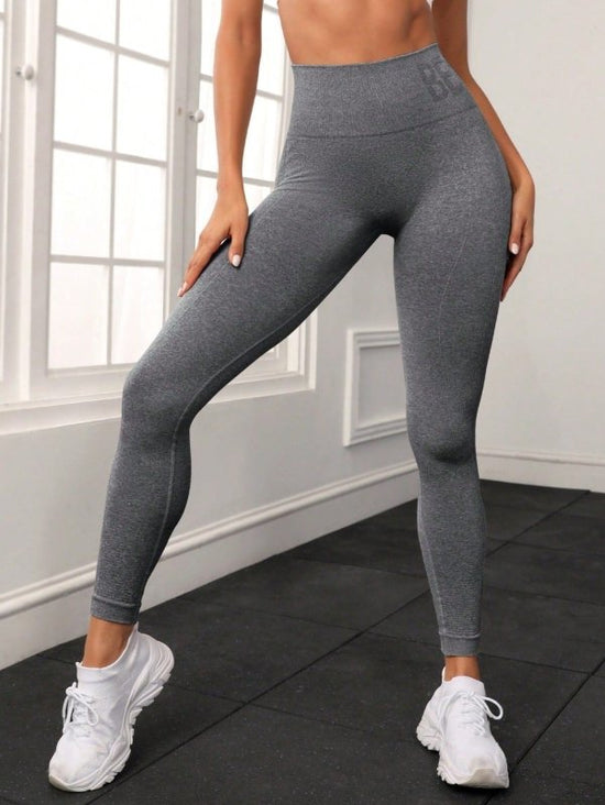 Seamless Letter Peach Yoga Hip Raise Skinny High Waist Exercise Workout Pants Women $46.96 Dana Fashion Color: Light Gray Size: L Women's clothing Product information: Applicable sports: fitness yoga Fabric name: Chemical Fiber blend Applicable scenarios: