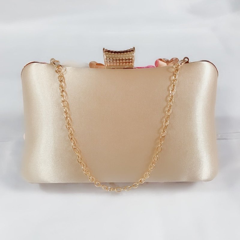 Sequined Flower Diamond Banquet Bag $84.35 Dana Fashion Color: Champagne Women's Bags Material: Silk Fabric texture: polyester fiber Lining texture: polyester Style: women's clutch Bag shape: pillow type Trendy Bags Style: Dinner Bag Opening method: ingot