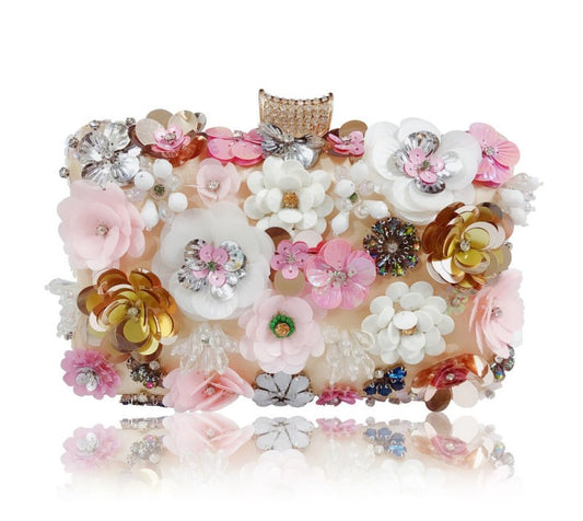 Sequined Flower Diamond Banquet Bag $84.35 Dana Fashion Color: Champagne Women's Bags Material: Silk Fabric texture: polyester fiber Lining texture: polyester Style: women's clutch Bag shape: pillow type Trendy Bags Style: Dinner Bag Opening method: ingot