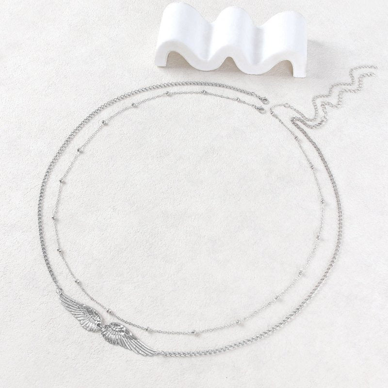 Sexy Double Wings Angel Waist Chain Accessories $15.94 Dana Fashion Color: Silver Women's Accessories Product information: Color: gold, silver Size: 115cm Material: Metal Hot element: Angel wings Style: European and American Transfer: Double Circle Length