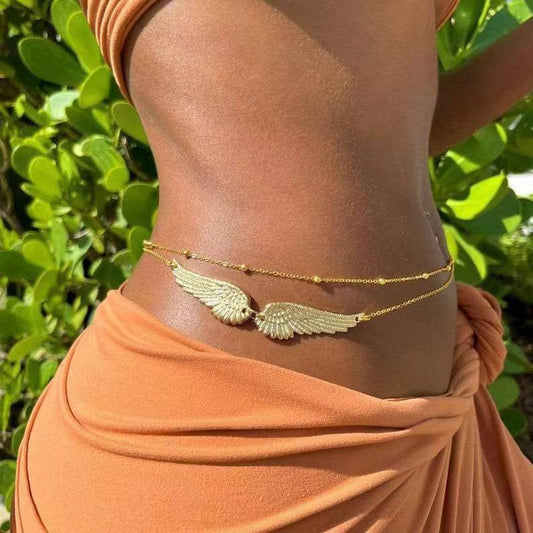 Sexy Double Wings Angel Waist Chain Accessories $15.94 Dana Fashion Color: Gold Women's Accessories Product information: Color: gold, silver Size: 115cm Material: Metal Hot element: Angel wings Style: European and American Transfer: Double Circle Length (