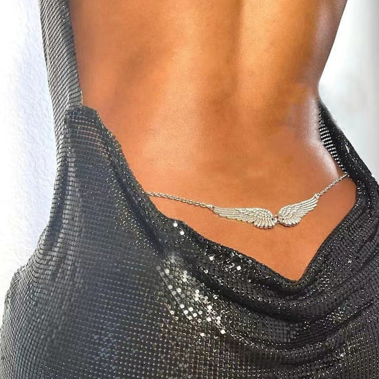 Sexy Double Wings Angel Waist Chain Accessories $15.94 Dana Fashion Color: Gold Women's Accessories Product information: Color: gold, silver Size: 115cm Material: Metal Hot element: Angel wings Style: European and American Transfer: Double Circle Length (