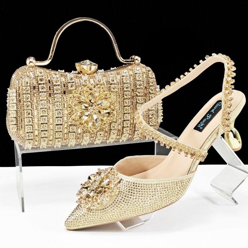 Sexy Women's Shoes And Bags Suit Drill Buckle Flower Decorative Ankle Drill Chain With Hard Clutch $169.90 Dana Fashion Color: Gold Size: 38 Women's shoes Product information: Pattern: Flowers Toe bracket shape: Tip Color: Black, champagne, rose, gold, gr