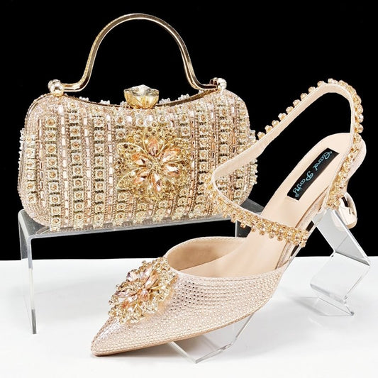Sexy Women's Shoes And Bags Suit Drill Buckle Flower Decorative Ankle Drill Chain With Hard Clutch $169.90 Dana Fashion Color: Black Size: 38 Women's shoes Product information: Pattern: Flowers Toe bracket shape: Tip Color: Black, champagne, rose, gold, g
