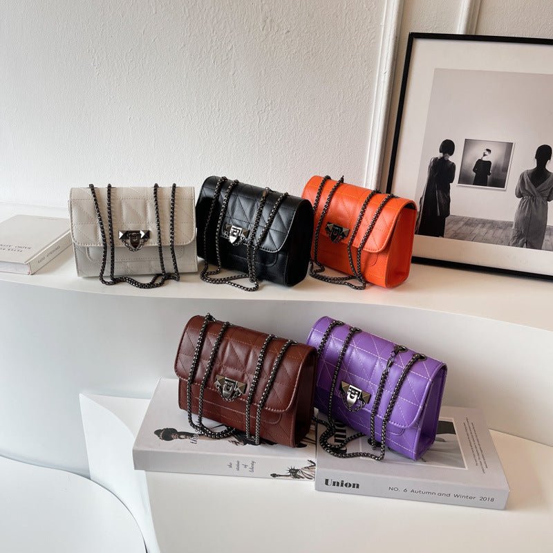 Shoulder Bag Women's Chain Lock Fashion Messenger Bag $34.02 Dana Fashion Color: Black Women's Bags Product information: Color: brown, orange, purple, white, black Hardness: soft Material: PU Suitcase shape: Horizontal Square Number of shoulder straps: Si