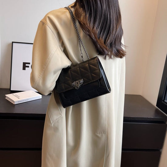 Shoulder Bag Women's Chain Lock Fashion Messenger Bag $34.02 Dana Fashion Color: Black Women's Bags Product information: Color: brown, orange, purple, white, black Hardness: soft Material: PU Suitcase shape: Horizontal Square Number of shoulder straps: Si