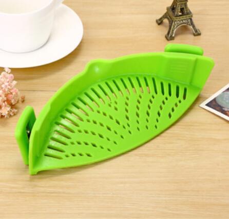 Silicone Clip-on Pot Pan Bowl Funnel Oil Strainer Creative Rice Washing Colander for Draining Liquid Fits All Pot Size $24.50 Dana Fashion format: Green Dana's Kitchen Overview: Uniform hollow design, no waste of filtering Silicone material, safe and heal