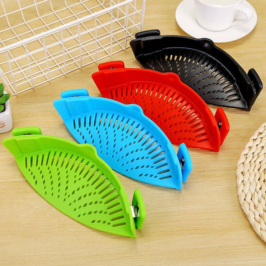 Silicone Clip-on Pot Pan Bowl Funnel Oil Strainer Creative Rice Washing Colander for Draining Liquid Fits All Pot Size $24.50 Dana Fashion format: Black Dana's Kitchen Overview: Uniform hollow design, no waste of filtering Silicone material, safe and heal