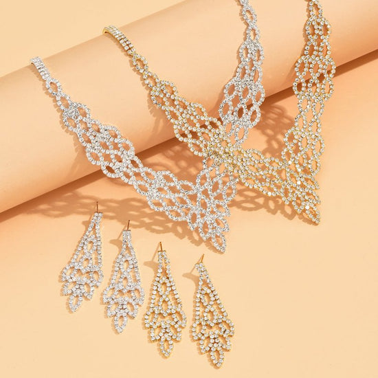Silver Crystal Stone Gold And Silver Color Necklace Suit $38.19 Dana Fashion Color: 905 Gold Women's Accessories Product information: Pattern: XINGX/Sun and Moon/cloud/Universe Treatment Process: Electroplating Color: 905 Gold, 905 Silver Applicable popul