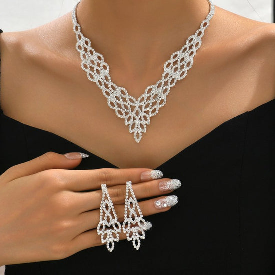Silver Crystal Stone Gold And Silver Color Necklace Suit $38.19 Dana Fashion Color: 905 Silver Women's Accessories Product information: Pattern: XINGX/Sun and Moon/cloud/Universe Treatment Process: Electroplating Color: 905 Gold, 905 Silver Applicable pop