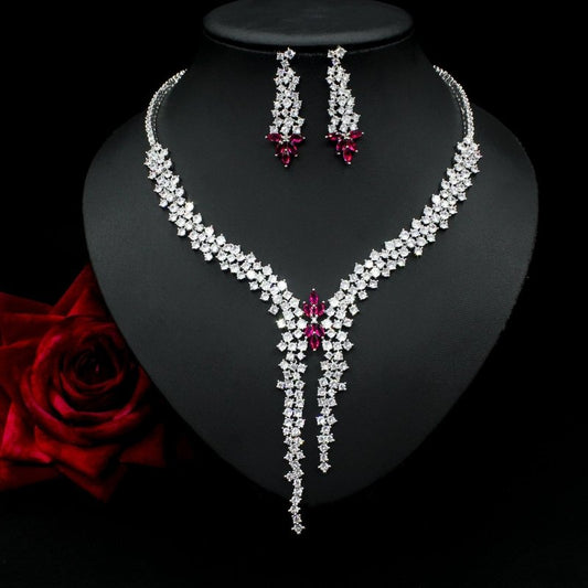 Silver Needle Fashion Exaggerated Inlaid Zircon Earrings And Necklace Set $272.74 Dana Fashion Color: Blue Women's Accessories Product information: Treatment Process: inlaid zircon Color: red, yellow, green, blue, white Pendant material: mixed gem inlaid
