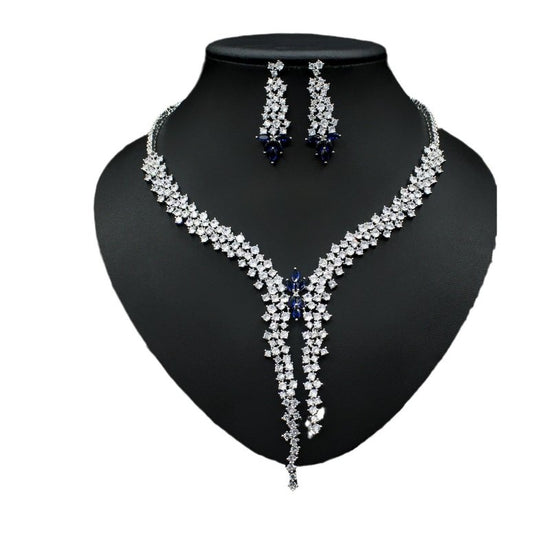 Silver Needle Fashion Exaggerated Inlaid Zircon Earrings And Necklace Set $272.74 Dana Fashion Color: Blue Women's Accessories Product information: Treatment Process: inlaid zircon Color: red, yellow, green, blue, white Pendant material: mixed gem inlaid