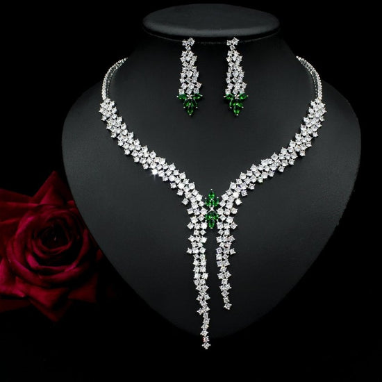 Silver Needle Fashion Exaggerated Inlaid Zircon Earrings And Necklace Set $272.74 Dana Fashion Color: Green Women's Accessories Product information: Treatment Process: inlaid zircon Color: red, yellow, green, blue, white Pendant material: mixed gem inlaid