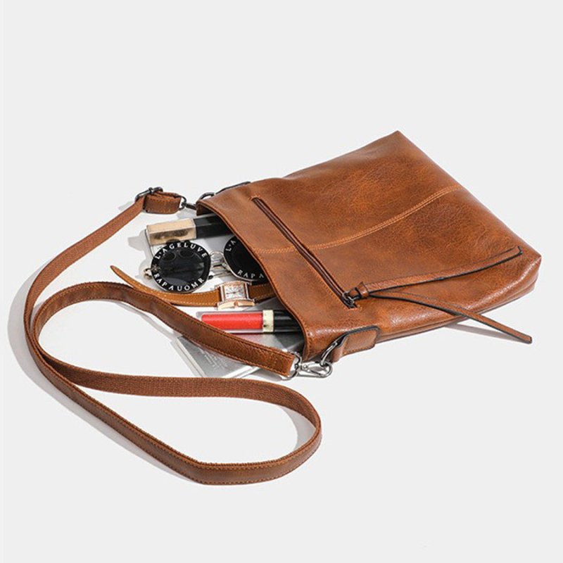 Simple And High-end Textured Artificial Leather Retro Men's And Women's Handbags Fashion $60.76 Dana Fashion Color: Brown Women's Bags Product information: Lining texture: polyester cotton Color: Brown Material: PU Packing list: Bag x1 Product Image: