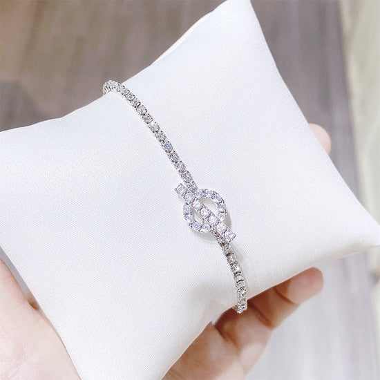 Simple Personality Bracelet Fashion Zircon Crystal Bracelet For Women $28.52 Dana Fashion Color: S018 Silver Women's Accessories Product information: Treatment Process: Electroplating Color: Silver S018 Style: Women's Material: Copper Shape: Geometric Pac