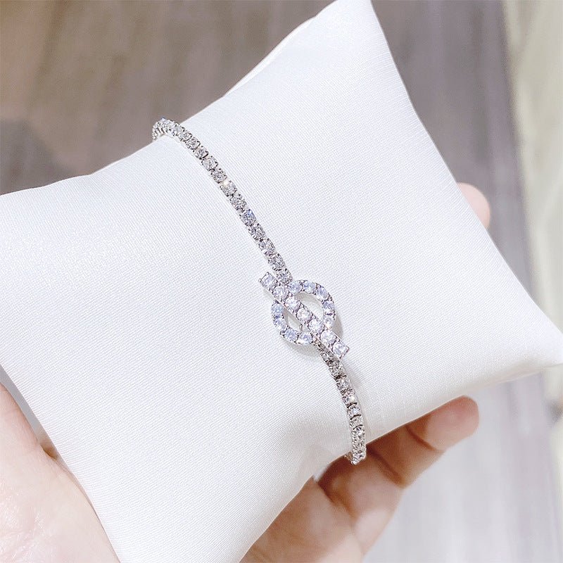 Simple Personality Bracelet Fashion Zircon Crystal Bracelet For Women $28.52 Dana Fashion Color: S018 Silver Women's Accessories Product information: Treatment Process: Electroplating Color: Silver S018 Style: Women's Material: Copper Shape: Geometric Pac