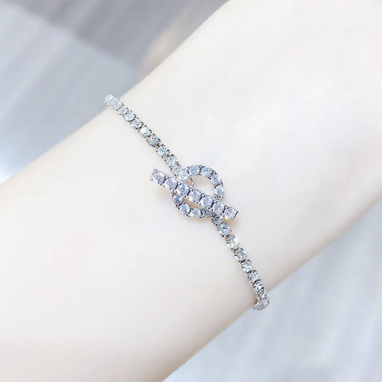 Simple Personality Bracelet Fashion Zircon Crystal Bracelet For Women $28.52 Dana Fashion Color: S018 Silver Women's Accessories Product information: Treatment Process: Electroplating Color: Silver S018 Style: Women's Material: Copper Shape: Geometric Pac