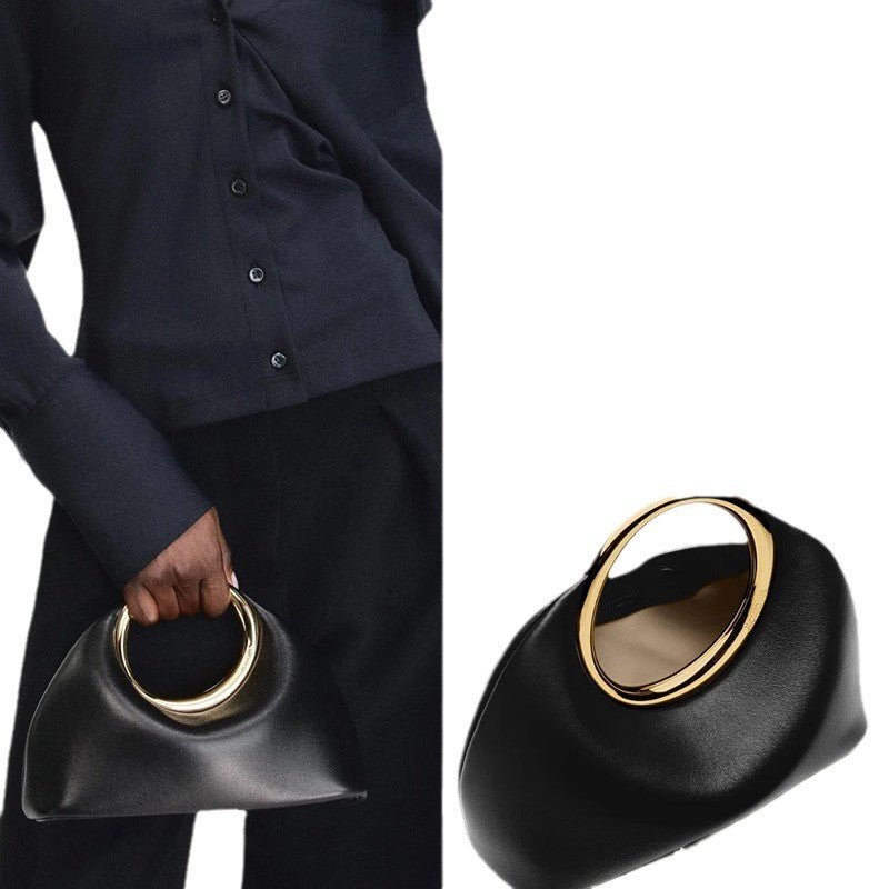 Simple Soft Leather Bag Hand Carrying Ring Hand-carrying $98.90 Dana Fashion Color: Beige Size: 30X13X23CM Women's Bags Product information: Applicable scenarios: Daily matching Color: Black, creamy-white, grass green, Rose Red, snake color Outer bag type