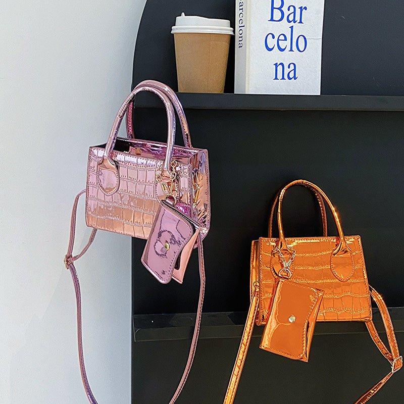 Simple Texture Shoulder Messenger Bag $29.29 Dana Fashion Color: Black Women's Bags Product information: Color: black, orange, green, pink, silver Material: PU Suitcase shape: Horizontal Square Packing list: Bag*1 Product Image: