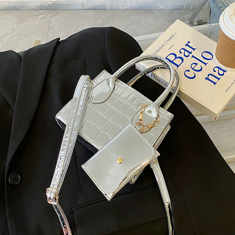 Simple Texture Shoulder Messenger Bag $29.29 Dana Fashion Color: Silver Women's Bags Product information: Color: black, orange, green, pink, silver Material: PU Suitcase shape: Horizontal Square Packing list: Bag*1 Product Image: