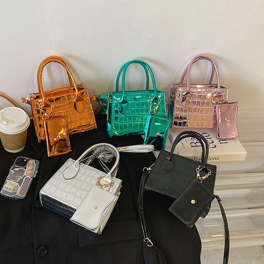 Simple Texture Shoulder Messenger Bag $29.29 Dana Fashion Color: Black Women's Bags Product information: Color: black, orange, green, pink, silver Material: PU Suitcase shape: Horizontal Square Packing list: Bag*1 Product Image: