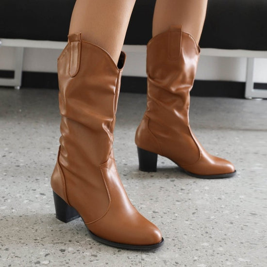 Simple Women's Fashion Leather Boots $65.99 Dana Fashion Color: Black Size: 33 Women's shoes Product information: Pattern: solid color Lining material: Cotton Color: white, black, brown Heel height: mid heel (3-5CM) Sock length: mid-calf Heel shape: chunk