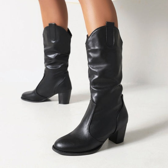 Simple Women's Fashion Leather Boots $65.99 Dana Fashion Color: Black Size: 33 Women's shoes Product information: Pattern: solid color Lining material: Cotton Color: white, black, brown Heel height: mid heel (3-5CM) Sock length: mid-calf Heel shape: chunk