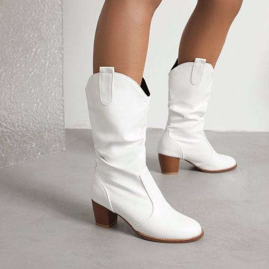 Simple Women's Fashion Leather Boots $65.99 Dana Fashion Color: Black Size: 33 Women's shoes Product information: Pattern: solid color Lining material: Cotton Color: white, black, brown Heel height: mid heel (3-5CM) Sock length: mid-calf Heel shape: chunk