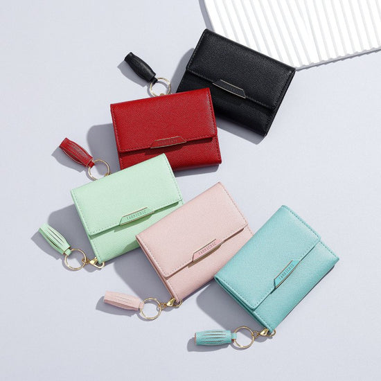 Simple Women's Short Wallet Tassel Small Folding $26.19 Dana Fashion Color: Y9121 Black Women's Bags Product information: Color: Y9121 Black, Y9121 pink, Y9121 wine red, Y9121 Blue, Y9121 Green, Y9121 Black, Y9121 pink, Y9121 wine red wallet Material: pu