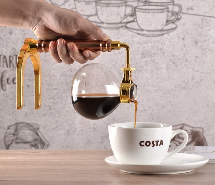 Siphon Coffee Maker Tea Pot Vacuum Coffeemaker Glass Machine $128.46 Dana Fashion Color: Black Dana's Kitchen Specifications: [Capacity] 3 persons (TCA-3) [Specification] 36*16*14CM [net weight] 1300 grams [Accessories] bracket + upper limb + lower limb +