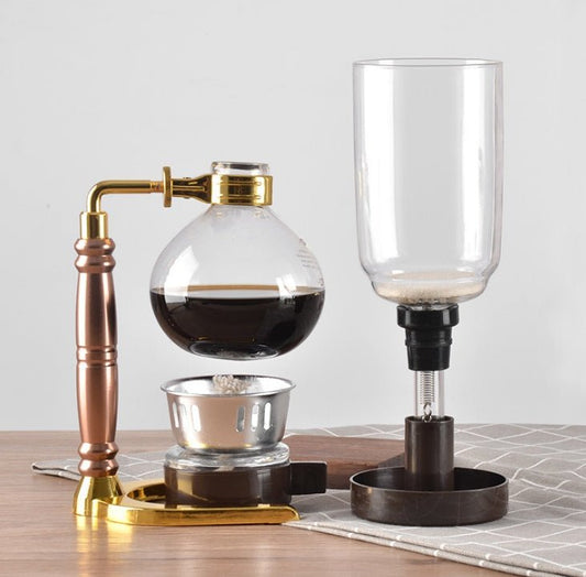 Siphon Coffee Maker Tea Pot Vacuum Coffeemaker Glass Machine $128.46 Dana Fashion Color: Black Dana's Kitchen Specifications: [Capacity] 3 persons (TCA-3) [Specification] 36*16*14CM [net weight] 1300 grams [Accessories] bracket + upper limb + lower limb +