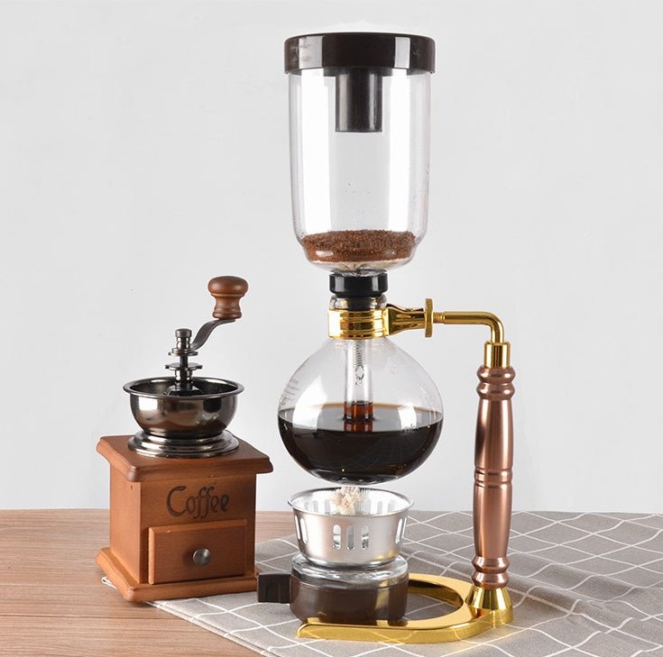 Siphon Coffee Maker Tea Pot Vacuum Coffeemaker Glass Machine $128.46 Dana Fashion Color: Black Dana's Kitchen Specifications: [Capacity] 3 persons (TCA-3) [Specification] 36*16*14CM [net weight] 1300 grams [Accessories] bracket + upper limb + lower limb +