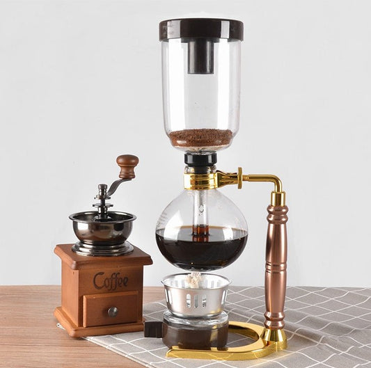 Siphon Coffee Maker Tea Pot Vacuum Coffeemaker Glass Machine $128.46 Dana Fashion Color: Black Dana's Kitchen Specifications: [Capacity] 3 persons (TCA-3) [Specification] 36*16*14CM [net weight] 1300 grams [Accessories] bracket + upper limb + lower limb +