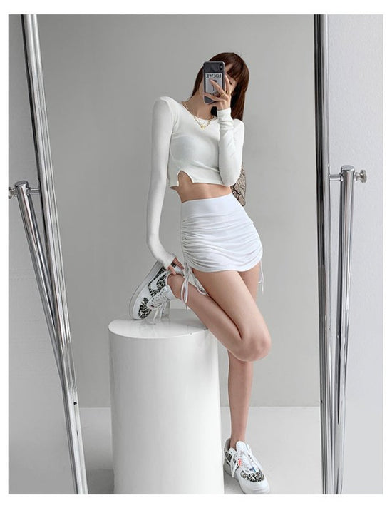 Skirts Tight Dancing Fitness Short Skirts Tide $150.50 Dana Fashion Color: White Size: L Women's clothing Product Information: Pattern: plain Color classification: black, white, khaki, gray Style: sexy Skirt type: pleated skirt Profile: Type A Waist type: