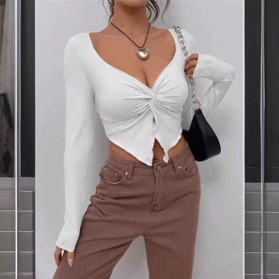 Slim-fit Front Twist Irregular Long Sleeve T-shirt For Women $27.52 Dana Fashion Color: Apricot Size: L Women's clothing Product information: Color: apricot, black, white Size: S,M,L Style: slim fit Style: pullover Fabric name: Rayon pull frame Main fabri