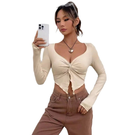 Slim-fit Front Twist Irregular Long Sleeve T-shirt For Women $27.52 Dana Fashion Color: Apricot Size: L Women's clothing Product information: Color: apricot, black, white Size: S,M,L Style: slim fit Style: pullover Fabric name: Rayon pull frame Main fabri