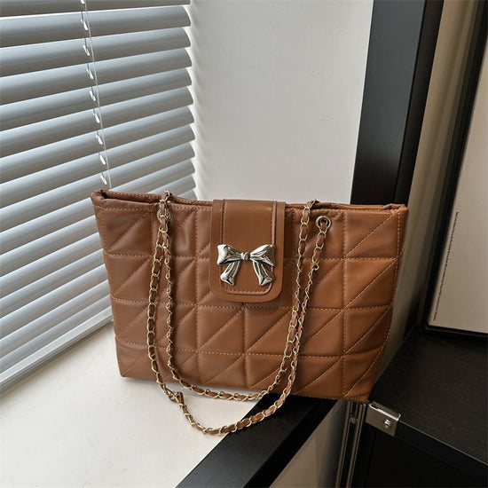 Soft Rhombus Chain Bag Large Capacity Totes $23.76 Dana Fashion Color: Black Women's Bags Product information: Lining texture: Polyester Color: black, white, brown, pink Hardness: medium and soft Material: PU Suitcase shape: Horizontal Square Number of sh