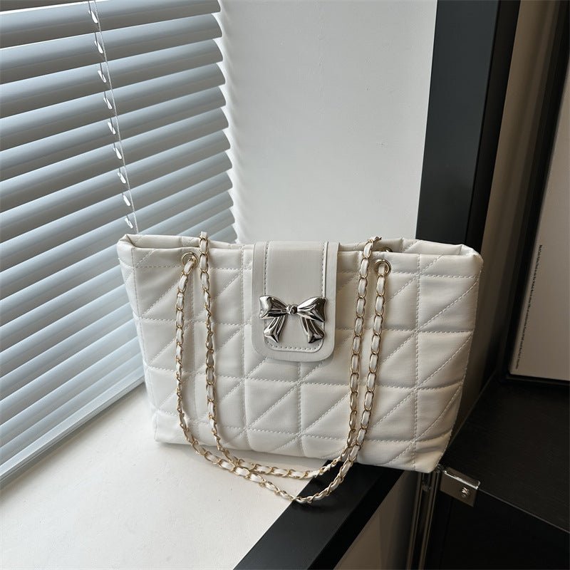 Soft Rhombus Chain Bag Large Capacity Totes $23.76 Dana Fashion Color: Black Women's Bags Product information: Lining texture: Polyester Color: black, white, brown, pink Hardness: medium and soft Material: PU Suitcase shape: Horizontal Square Number of sh