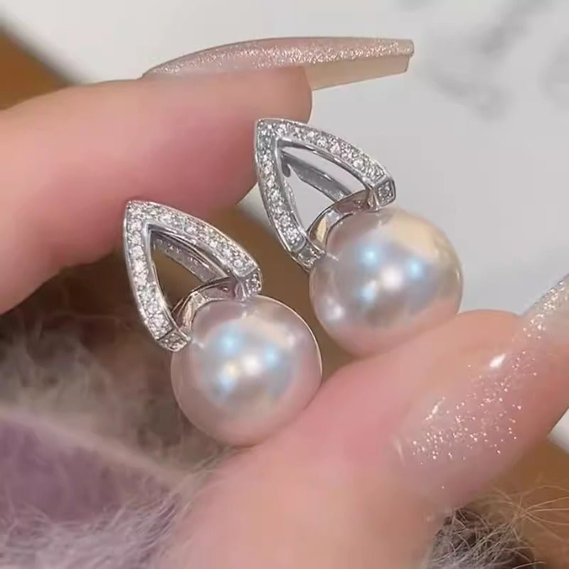 Special-interest Design Simple Zircon Pearl Earrings Women's Fashion $18.38 Dana Fashion Color: Zircon Pearl Earrings Women's Accessories Product information: Treatment Process: inlaid zircon Color: zircon pearl earrings Applicable population: Female Mate
