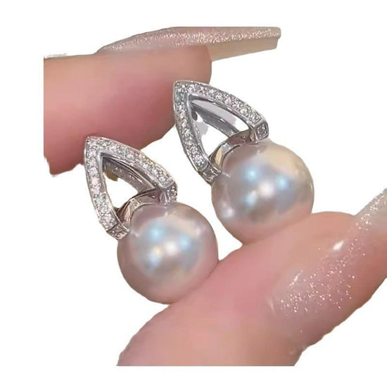 Special-interest Design Simple Zircon Pearl Earrings Women's Fashion $18.38 Dana Fashion Color: Zircon Pearl Earrings Women's Accessories Product information: Treatment Process: inlaid zircon Color: zircon pearl earrings Applicable population: Female Mate